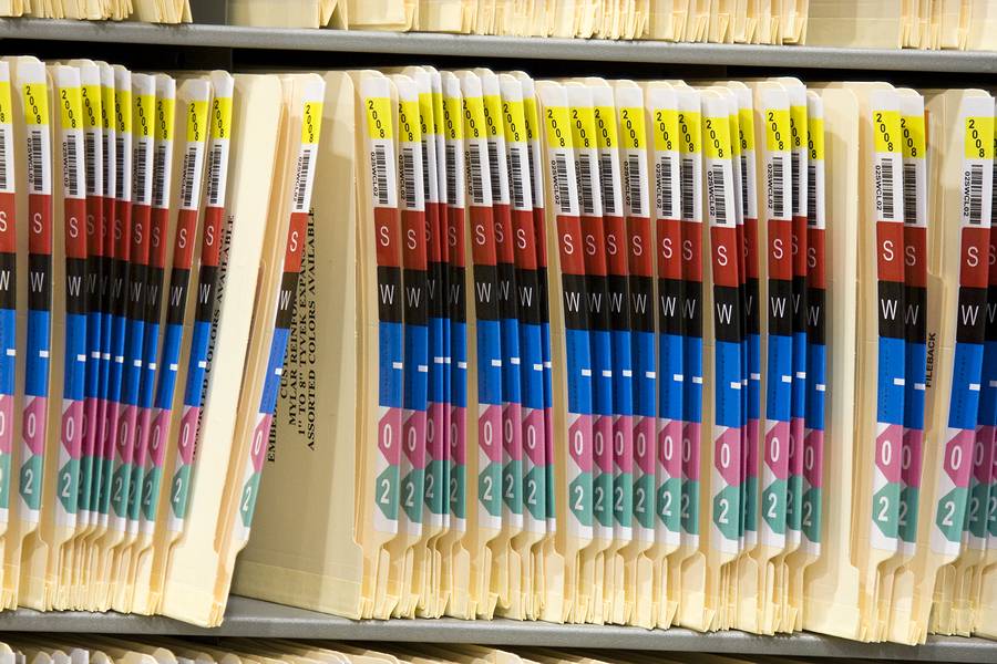 medical records on a shelf